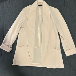 A pink blazer size small from simply styled